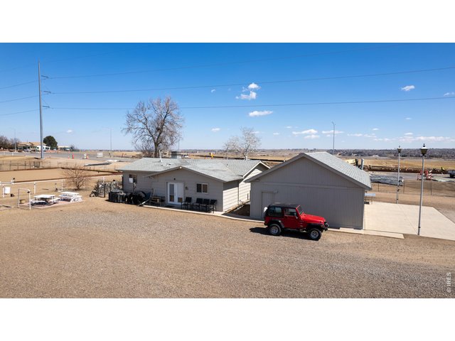 Property Photo 16 The house and detached 60'x40' garage