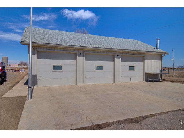 Property Photo 20 The garage has 3  south facing overhead doors