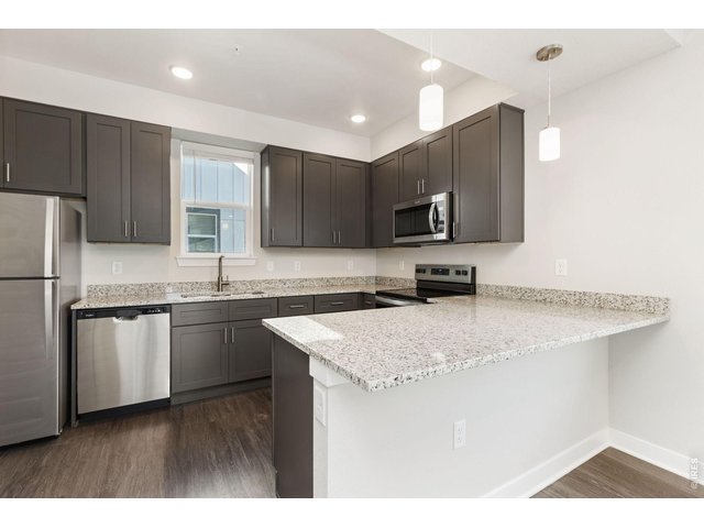 Property Photo 9 Kitchen with Ample Counter Space.