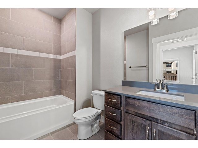 Property Photo 9 Second Bath- Finishes may vary. Not actual home. 