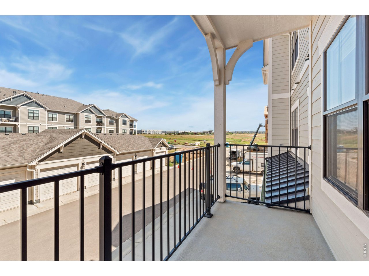 Property Photo 11 Covered Deck- Finishes may vary. 