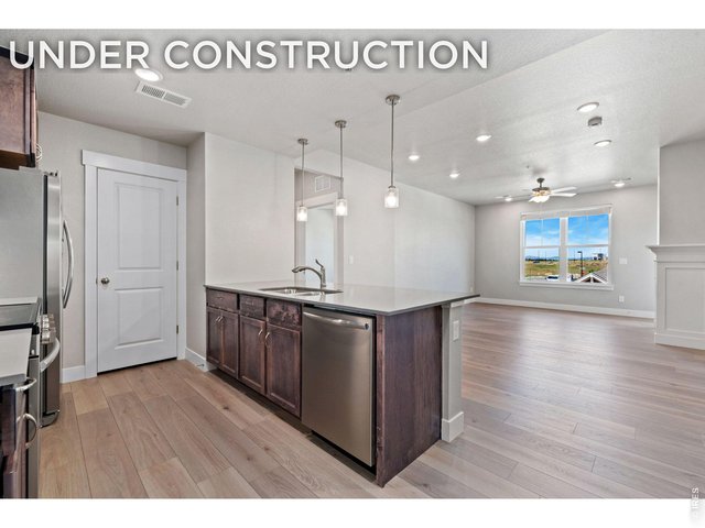 Property Photo 1 Kitchen- Finishes may vary. Not actual Home. 