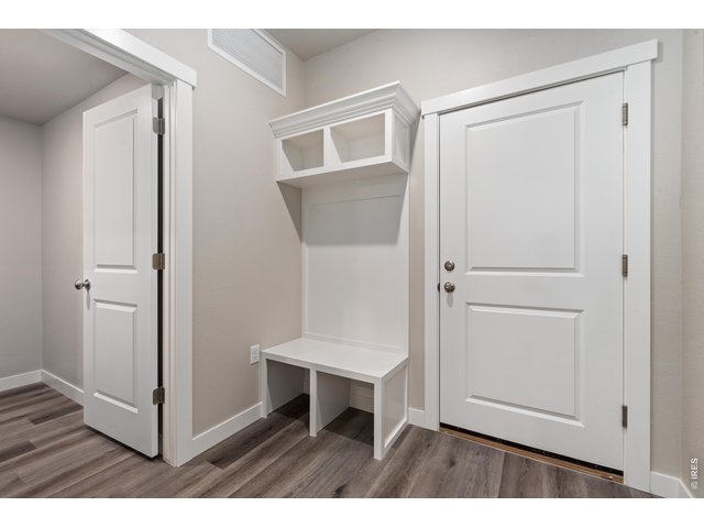 Property Photo 21 Entry from Garage - Finishes may vary. Not actual unit. 