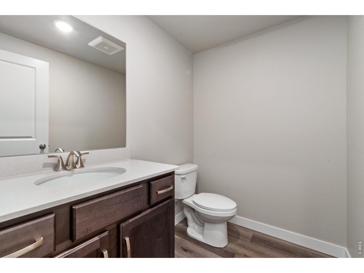 Property Photo 22 Powder Bath - Finishes may vary. Not actual unit. 