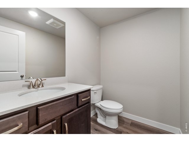Property Photo 22 Powder Bath - Finishes may vary. Not actual unit. 