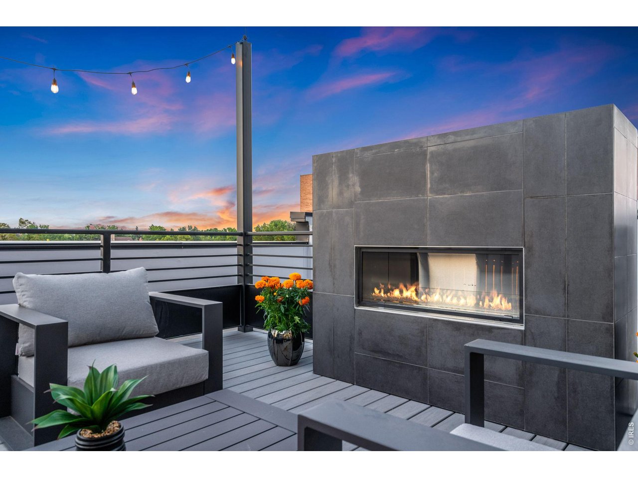 Gorgeous, modern outdoor fireplace on common deck