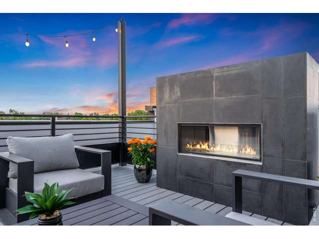 Property Photo 29 Gorgeous, modern outdoor fireplace on common deck