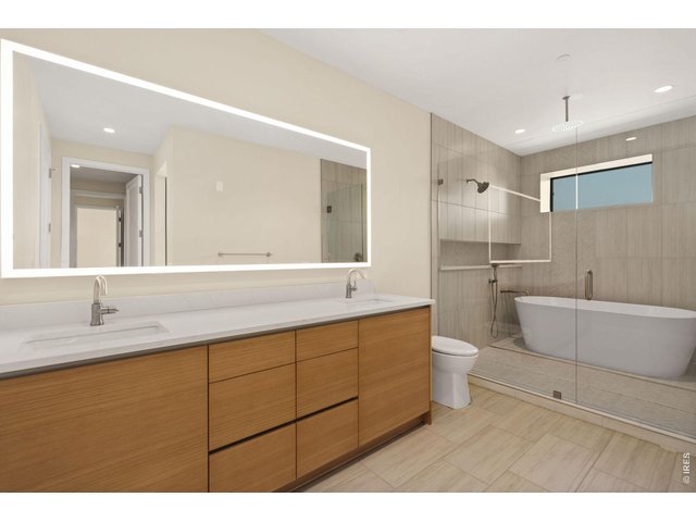 Property Photo 16 Epic, modern stand alone tub in shower