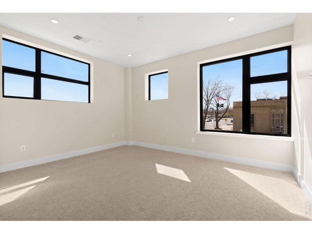Property Photo 19 Bedroom 2 combines natural light with privacy, boasting 2 privacy windows