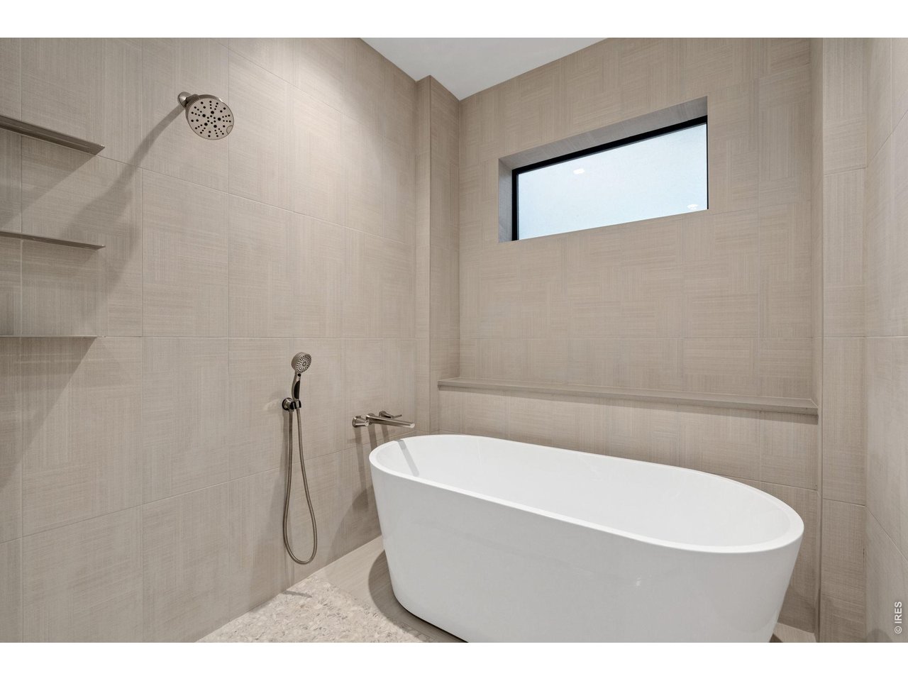 Modern standalone tub in-shower design