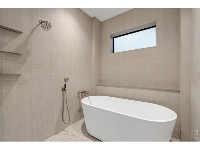 Property Photo 14 Modern standalone tub in-shower design