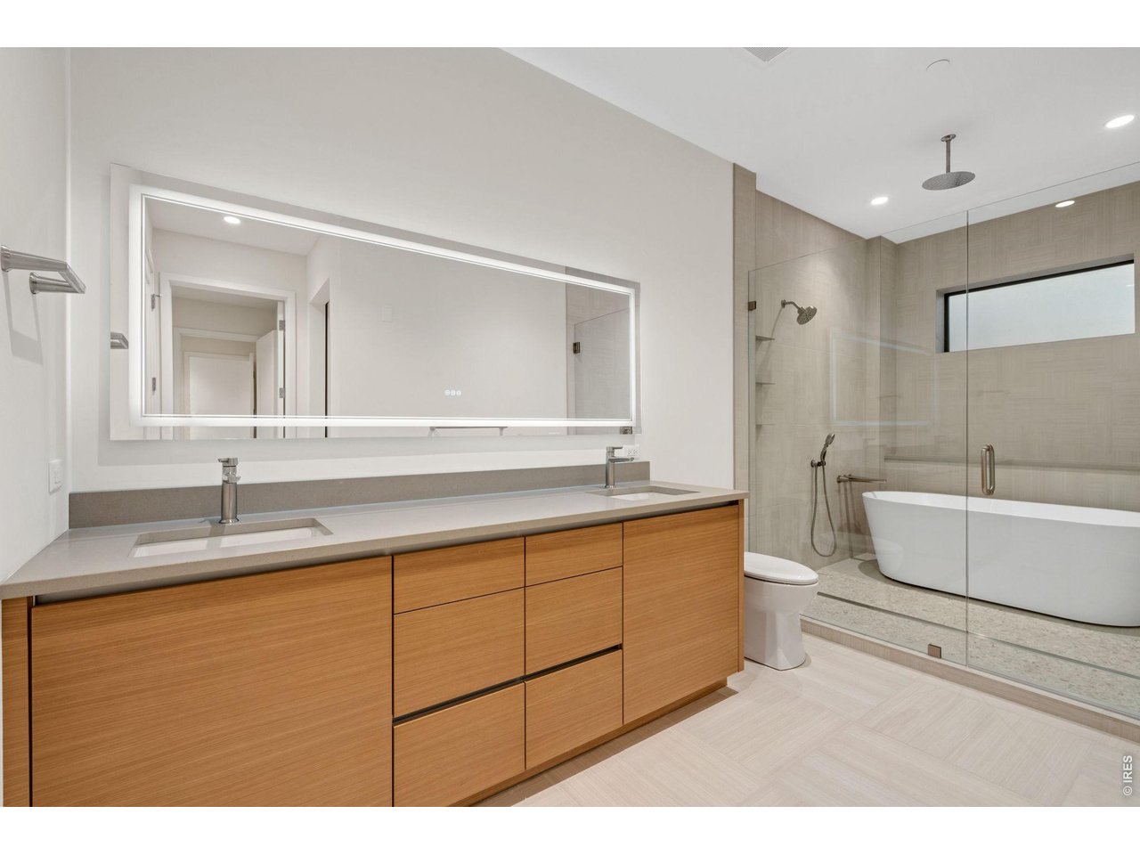 Custom 5 piece primary bathroom with standalone tub in-shower design