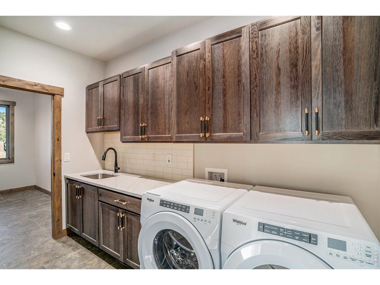 Laundry room with sink