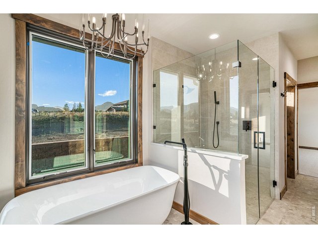 Property Photo 16 Zero entry glass shower