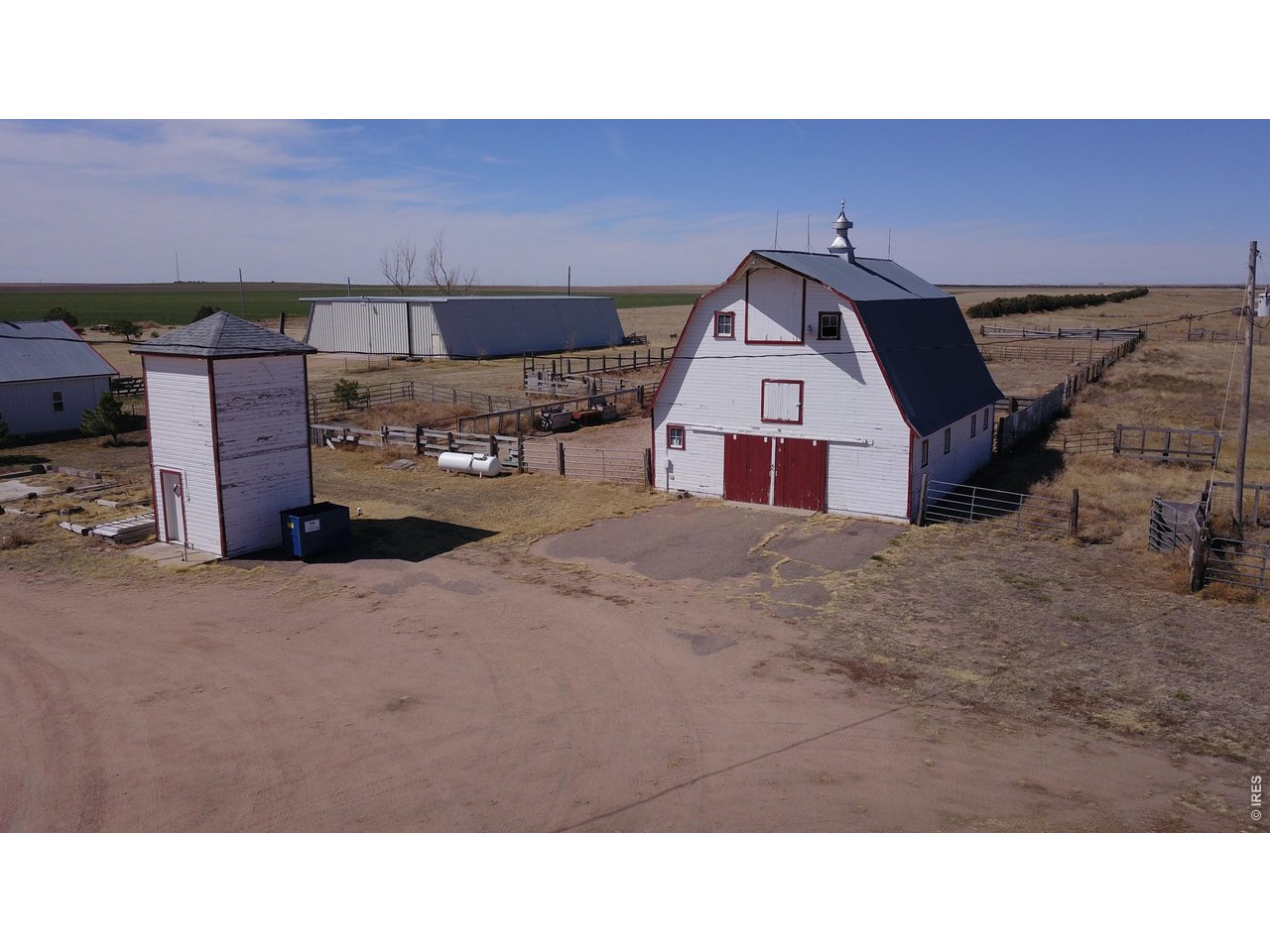 Property Photo 36 30x42 Barn with 5 horse stalls and useable hay loft