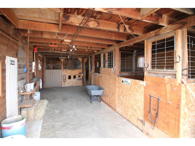 Property Photo 37 Interior of barn and horse stalls