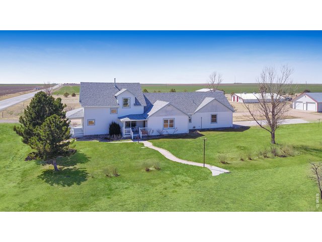 Property Photo 3 Aerial of home looking south