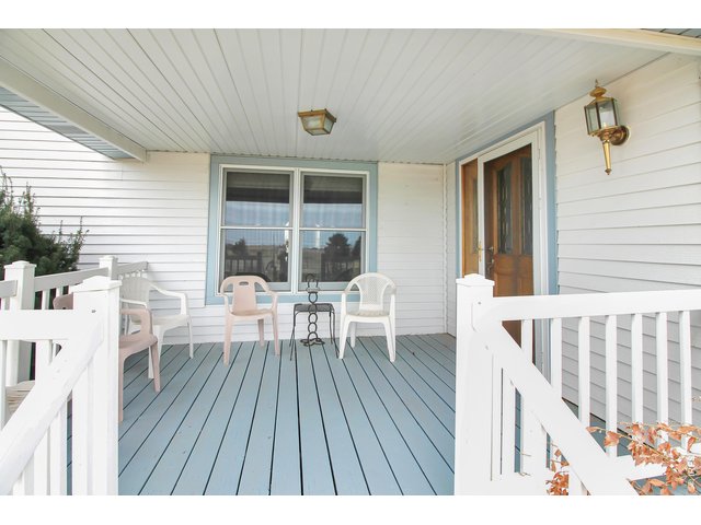 Property Photo 13 Covered Porch on the North side