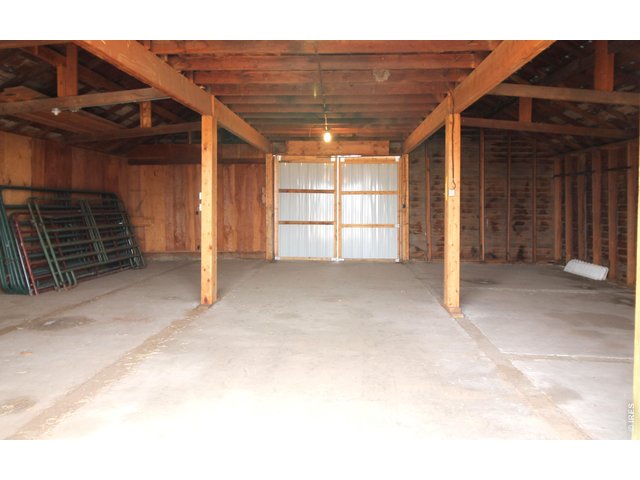 Property Photo 39 Interior of granary, was used as a hay barn for horses.