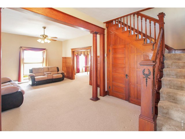Property Photo 7 Entry looking into living room.