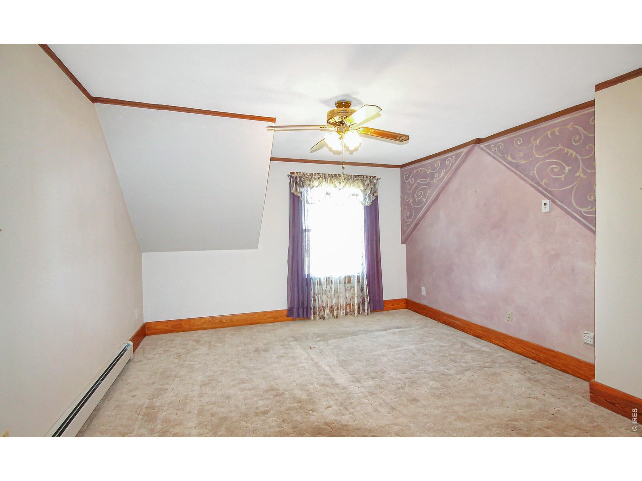 Property Photo 24 Primary bedroom 15x13, with walk-in closet.