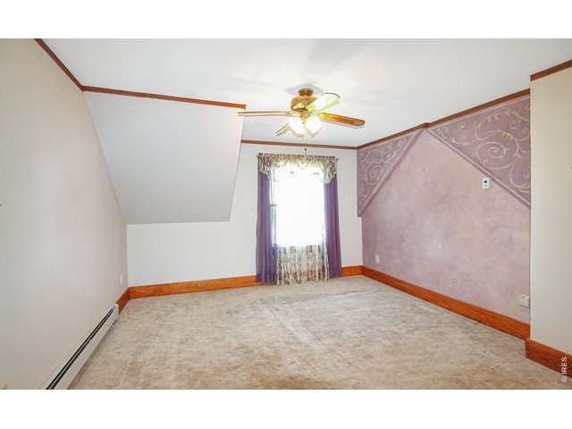 Property Photo 24 Primary bedroom 15x13, with walk-in closet.