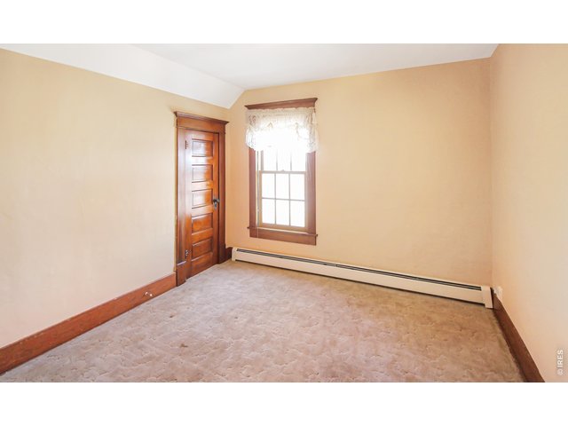 Property Photo 28 Northeast bedroom 11x10