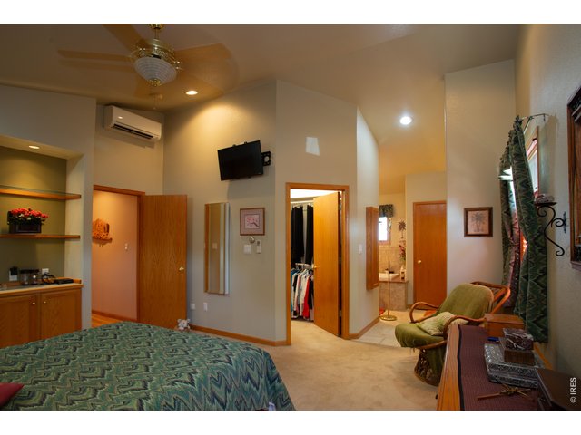 Property Photo 14 Featured are a walk-in closet and 5 piece bath