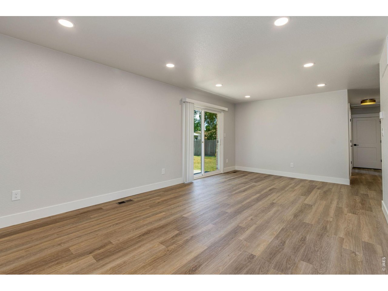 Family room leads to the backyard