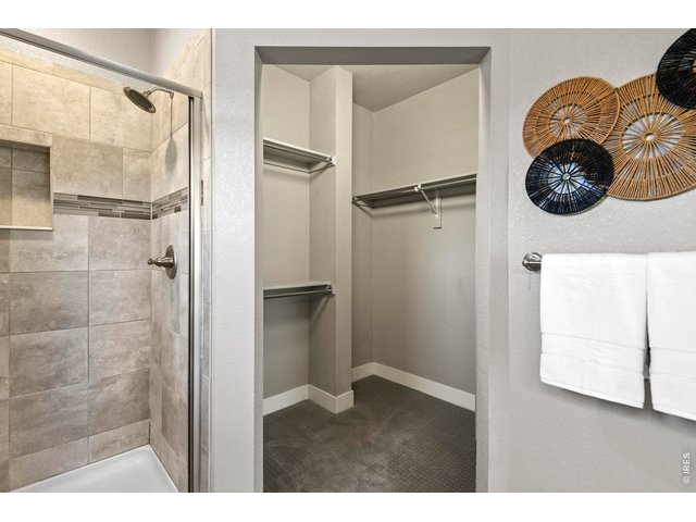 Property Photo 23 Primary Bedroom Walk-in Closet