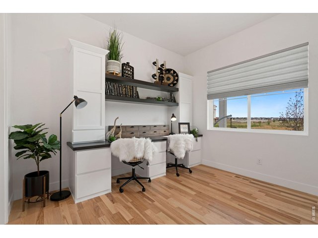 Property Photo 15 Main Floor Office with Custom Builtins