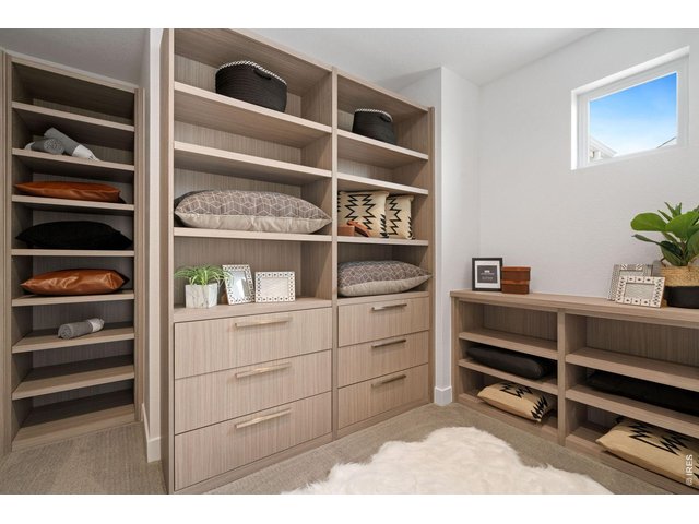 Property Photo 21 Custom Primary Closet by Tharp!
