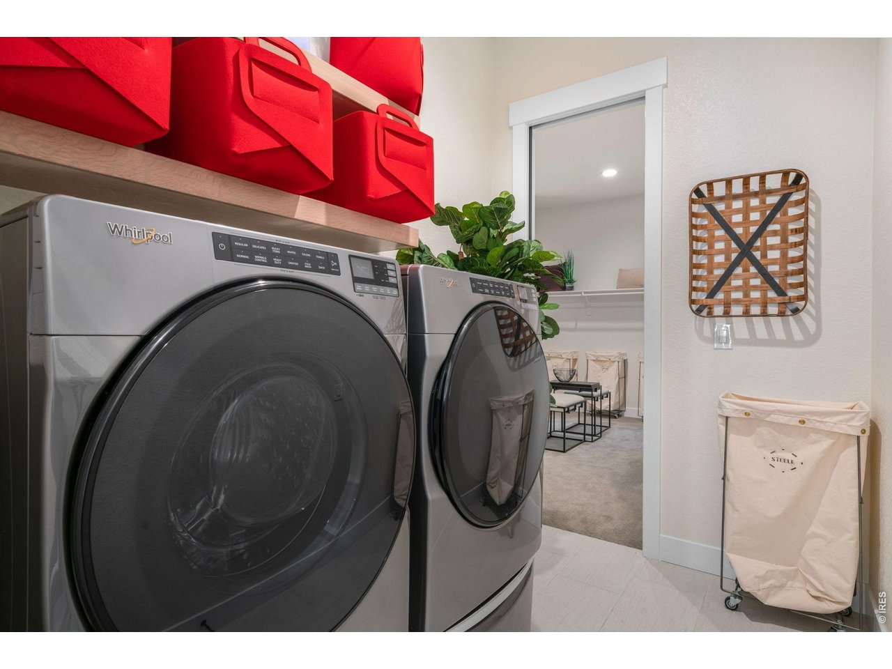 Main Floor Laundry/mud room with pass through to primary closet