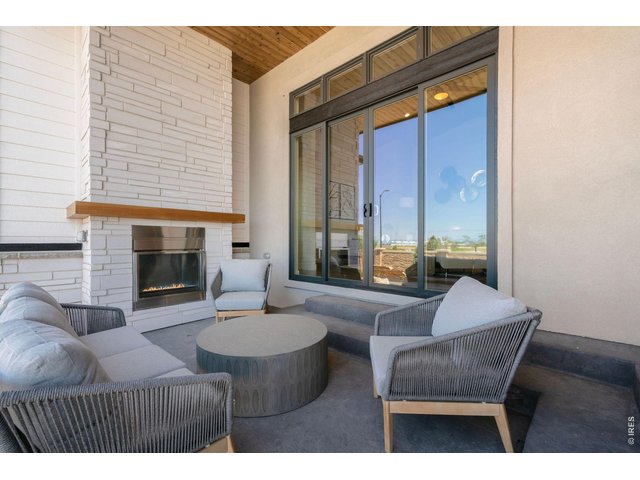 Property Photo 29 Covered Back Patio with Fireplace