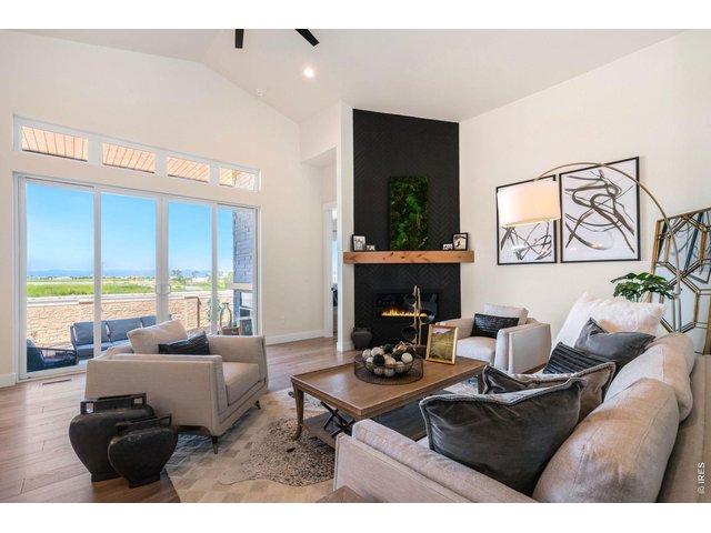 Property Photo 6 Vaulted Ceiling in Living Room with Linear Gas Fireplace!