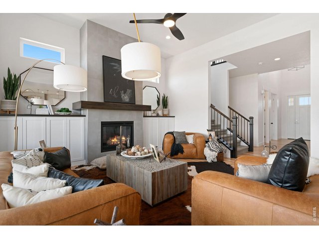 Property Photo 8 Elevated Ceilings in Living Room with Gas Fireplace
