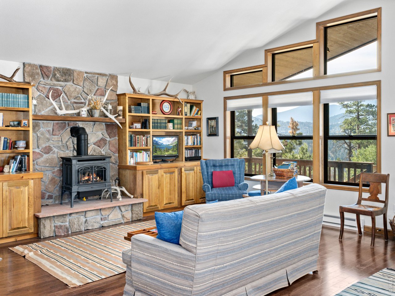 Open living area with gas fireplace