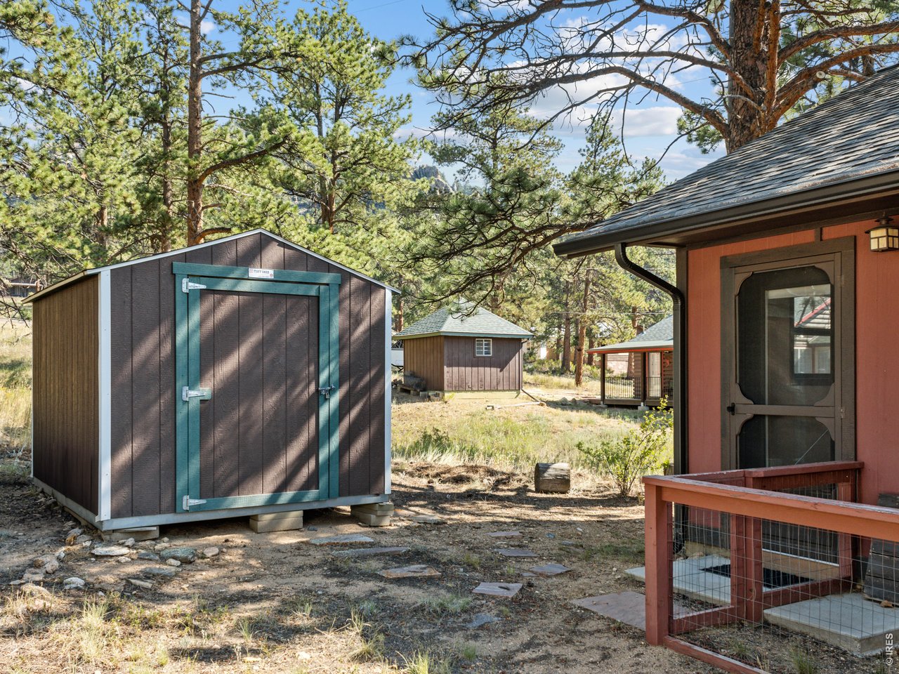 detached storage shed and exterior entrance into primary suite