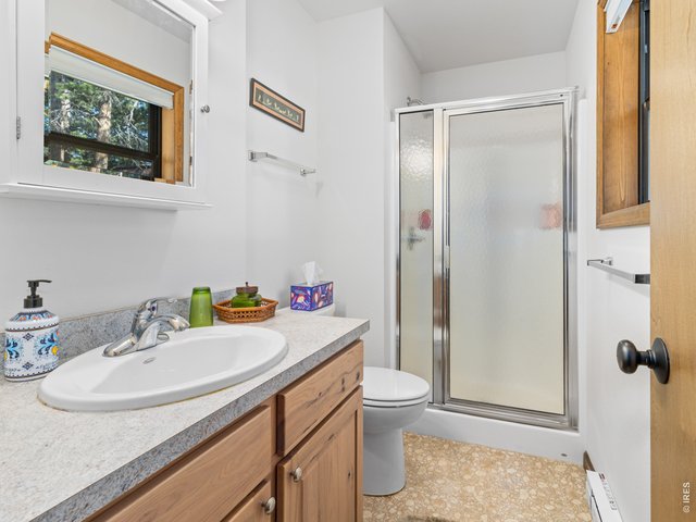 Property Photo 13 Primary 3/4 bath