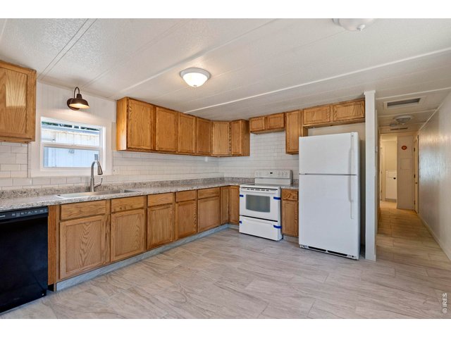 Property Photo 12 This home features lots of natural light, with all new vinyl windows throughout the home. 