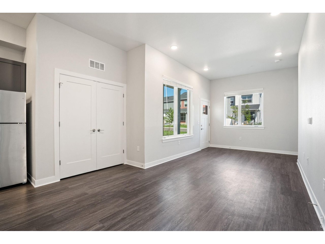 The laundry is conveniently located next to the living room.