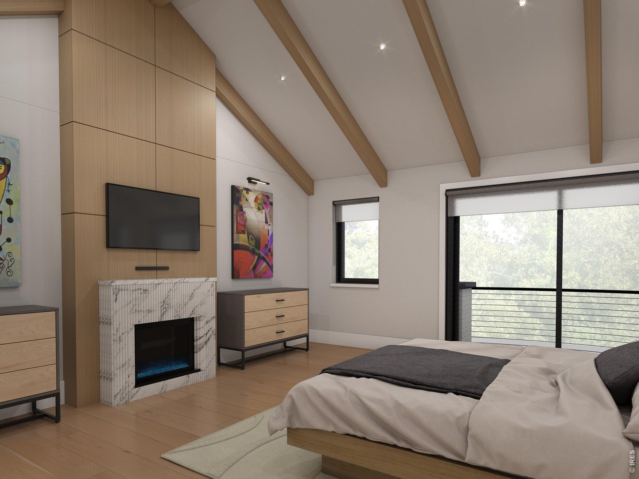 Primary suite bedroom with stunning vaulted ceilings, private deck and personal fireplace. 