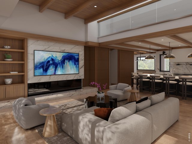 Property Photo 4 Open living room with custom built-ins. The perfect place to cozy up for relaxed evenings. 