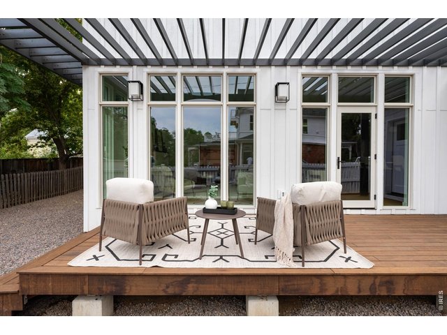 Property Photo 16 Main level outdoor living space is perfect for relaxing mornings and evenings. 