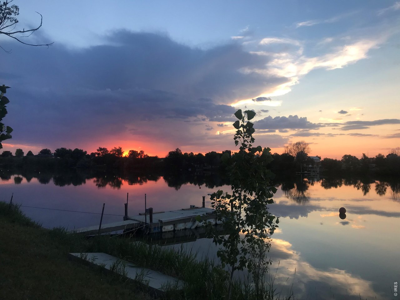 Seller Photos from Summer. 18-acre lake that can be used for many water activities like Jet Skiing, Wake Surfing, Water Skiing, Kayaking, Canoeing, Waterfowl Hunting, fishing, and more. 
