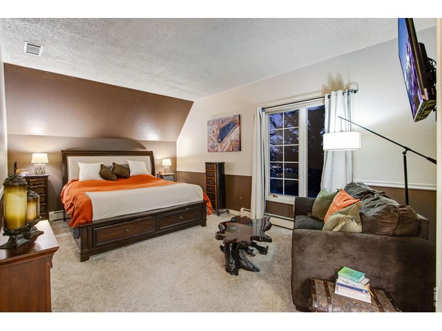 Property Photo 38 Massive bedroom with retreat and north-facing window with private retreat and sliding glass door leading to its own balcony looking over the lake. 