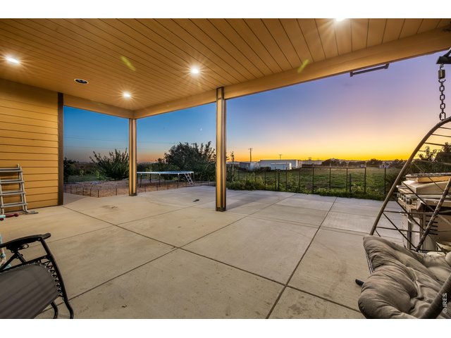 Property Photo 24 Covered back patio to enjoy the Beautiful Sunsets & scenery