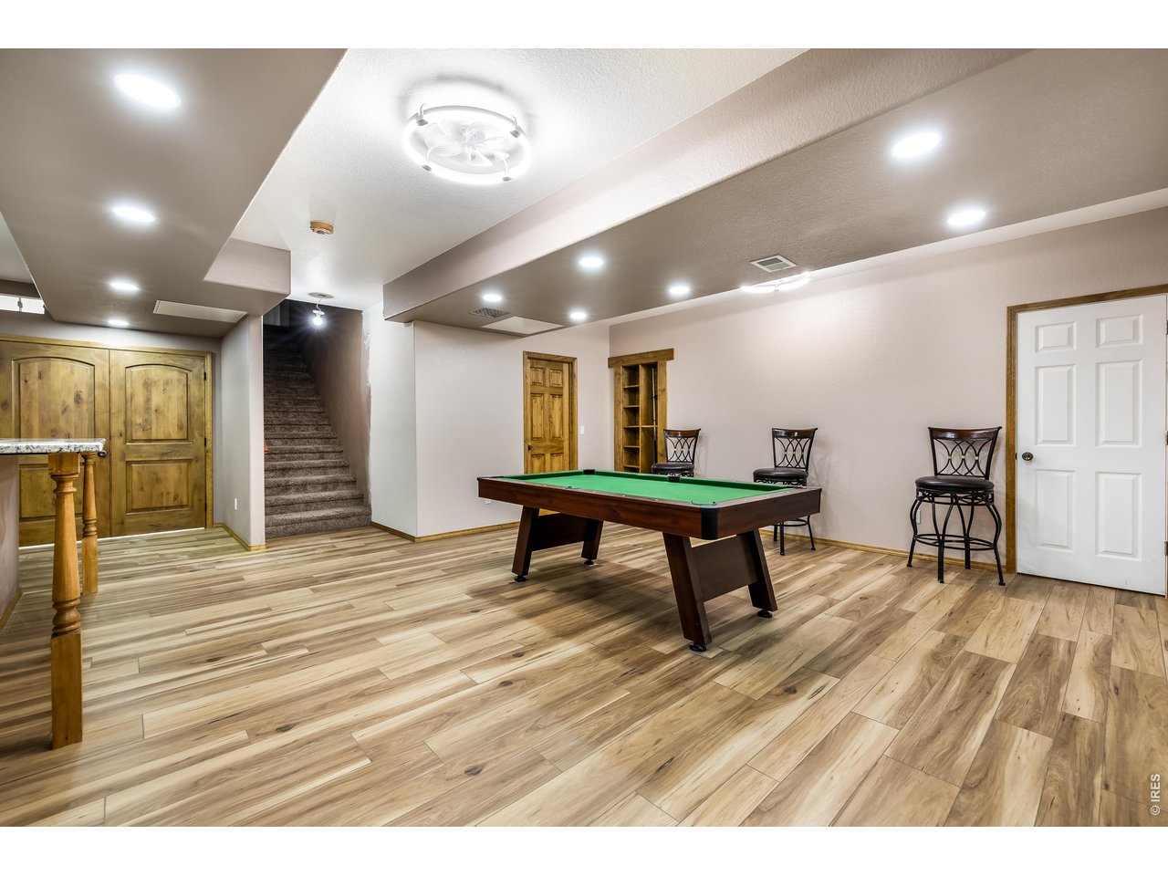 Recreation pool area offset by Theatre Room & Flex Space workout room