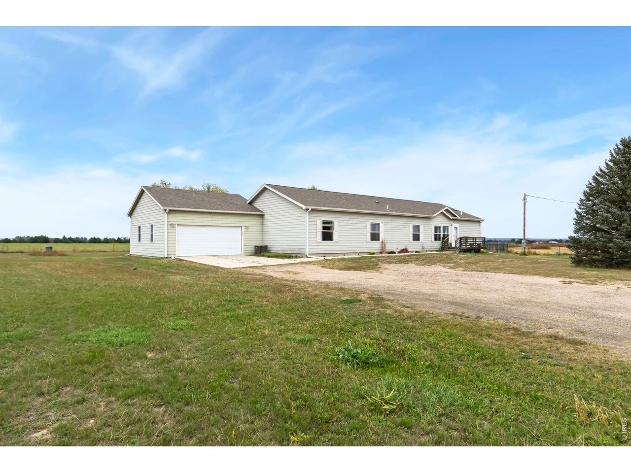 2 car attached garage with interior access and rear access door.