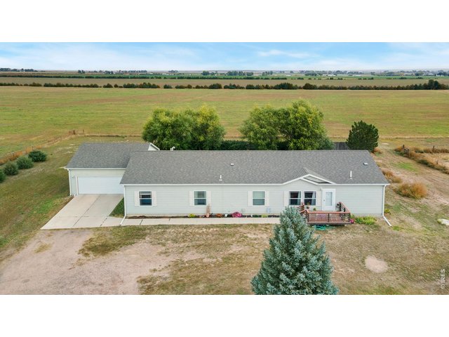 Property Photo 41 Aerial front view 
